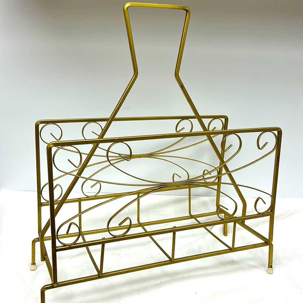 - Mid Century Modern gold tone metal scroll design  record/magazine rack
